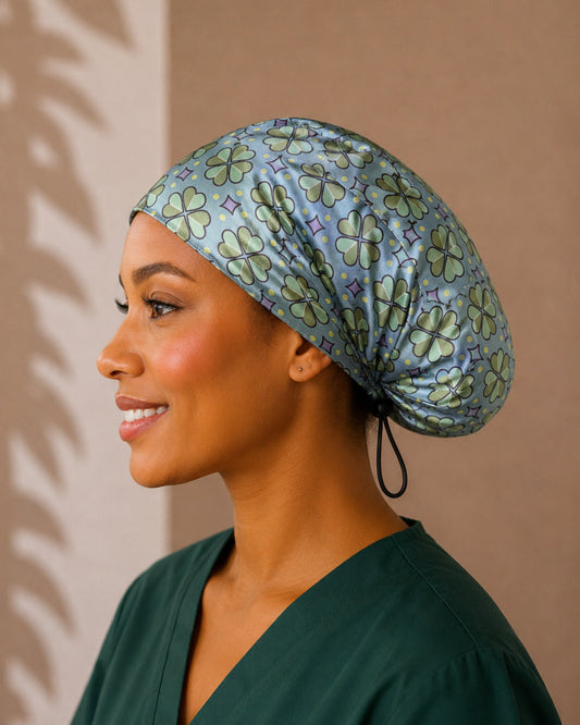 Model wearing BlissSilk Euro-style mulberry silk scrub cap in clover print