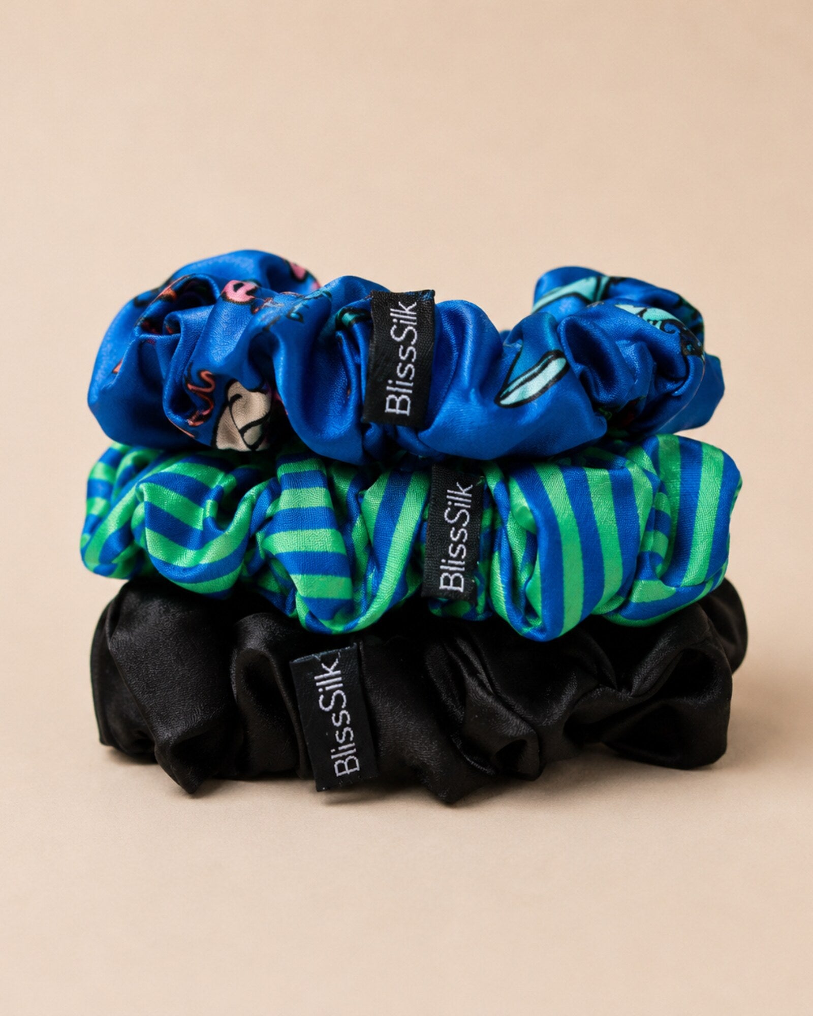 Three large mulberry silk scrunchies in black, superhero and stripe prints — BlissSilk three pack