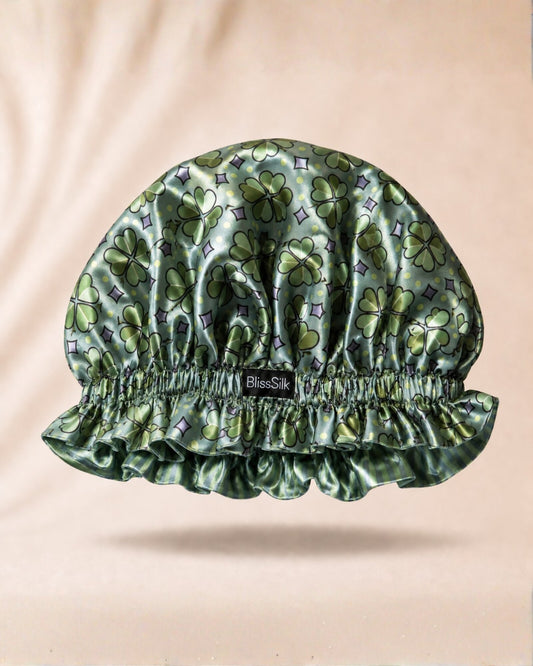 Reversible BlissSilk mulberry silk sleep bonnet in clover and stripe prints