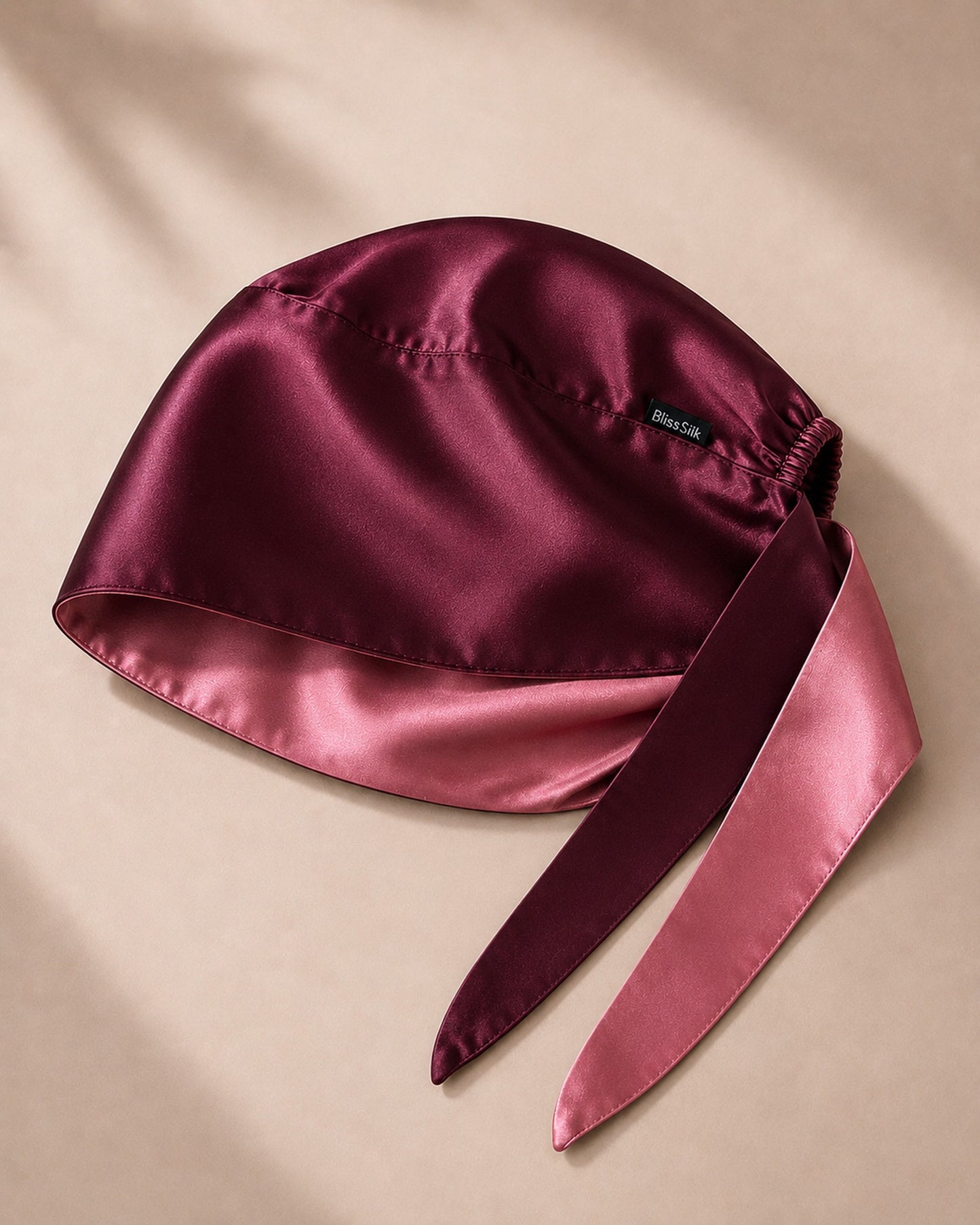 Silk Scrub Cap in Wine/Pink Berry, wine side showing — BlissSilk