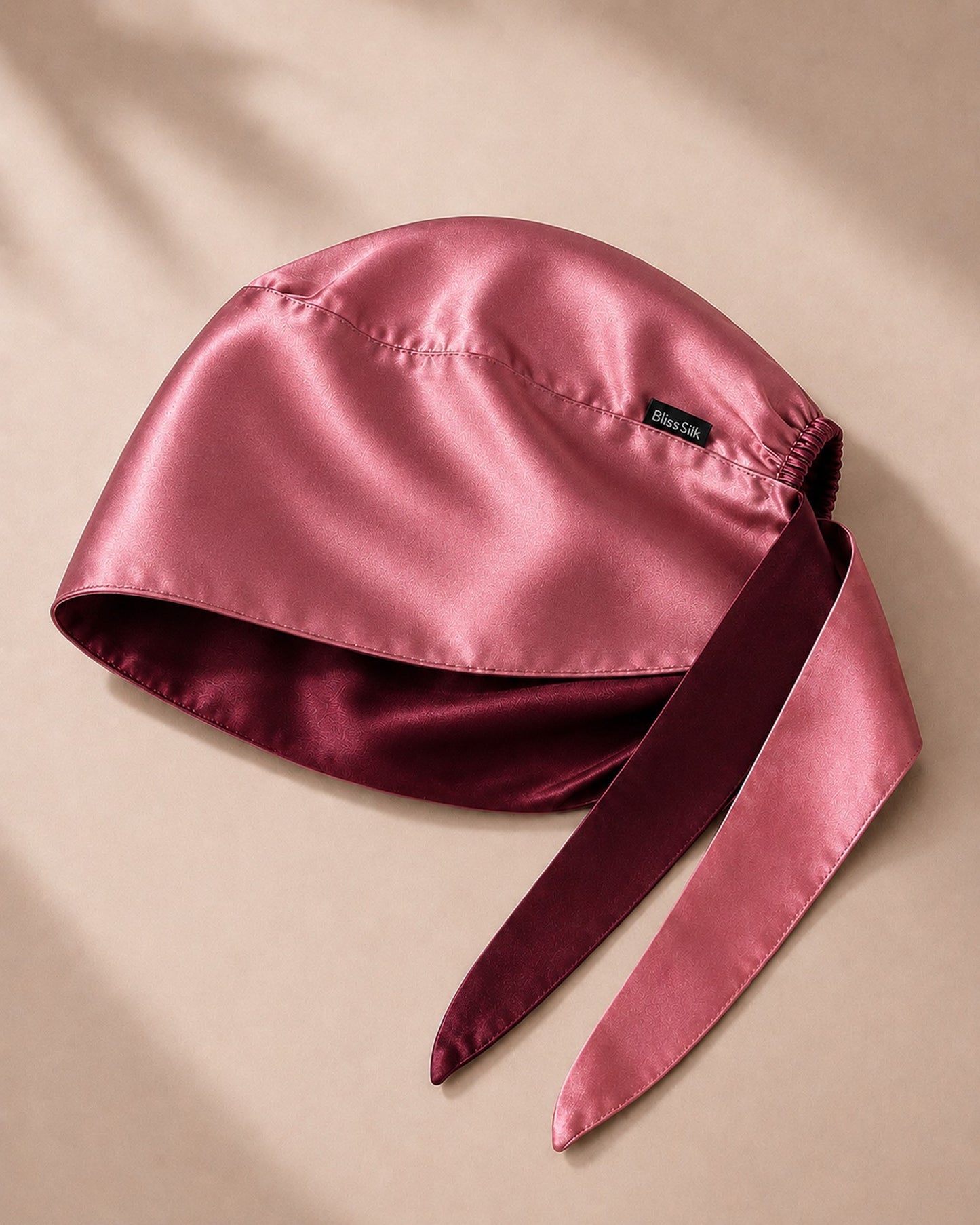 Silk Scrub Cap in Wine/Pink Berry, pink berry side showing — BlissSilk